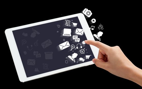 Hand touching tablet and multimedia icons