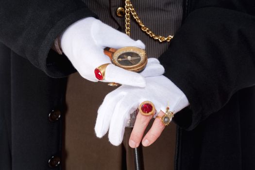 Closeup of Magician Hands with Gloves and Rings