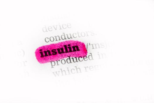 Insulin  Dictionary Definition closeup highlighted in pink