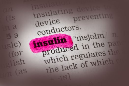 Insulin  Dictionary Definition closeup highlighted in pink