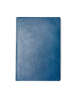 Blue closed book isolated over white background. View from above.