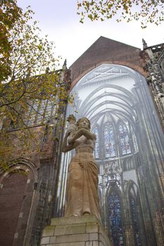 The statue of Corinne Franz�n-Heslenfeld in the direction of the Dom of Utrecht, Netherlands 