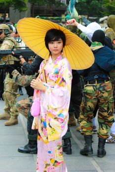 Bangkok - Aug 31: An unidentified Japanese anime cosplay pose  on August 31, 2014 at Central World, Bangkok, Thailand.