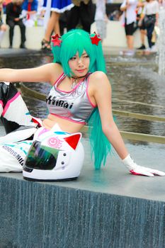 Bangkok - Aug 31: An unidentified Japanese anime cosplay pose  on August 31, 2014 at Central World, Bangkok, Thailand.