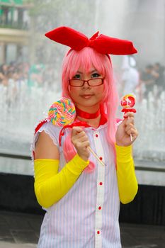 Bangkok - Aug 31: An unidentified Japanese anime cosplay pose  on August 31, 2014 at Central World, Bangkok, Thailand.