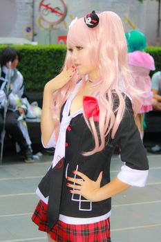 Bangkok - Aug 31: An unidentified Japanese anime cosplay pose  on August 31, 2014 at Central World, Bangkok, Thailand.