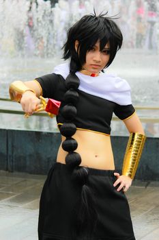 Bangkok - Aug 31: An unidentified Japanese anime cosplay pose  on August 31, 2014 at Central World, Bangkok, Thailand.