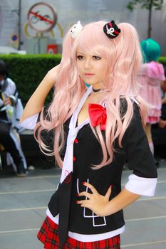 Bangkok - Aug 31: An unidentified Japanese anime cosplay pose  on August 31, 2014 at Central World, Bangkok, Thailand.