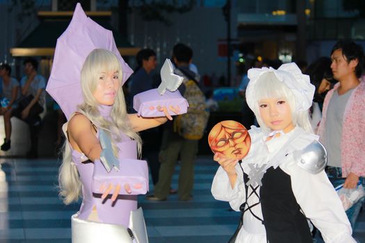 Bangkok - Aug 31: An unidentified Japanese anime cosplay pose  on August 31, 2014 at Central World, Bangkok, Thailand.