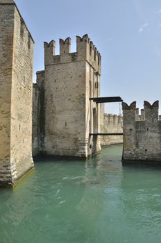 The Scaliger Castle at Sirmione on lake Garda, Italy. The Castle was built in the 13th century.  This is a rare example of medieval port fortification, which was used by the Scaliger fleet.