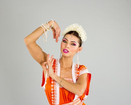 Beautiful Indian girl dancing in national dress