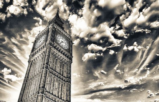 London, Wonderful upward view of Big Ben Tower and Clock at sunset.