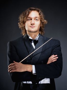 Portrait of a Young Conductor Holding a Baton.