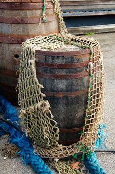 Details of colorful fishing nets in a fishermen port background