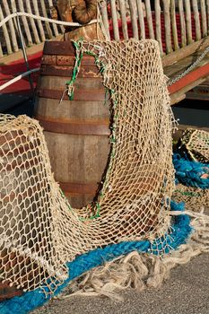 Details of colorful fishing nets in a fishermen port background