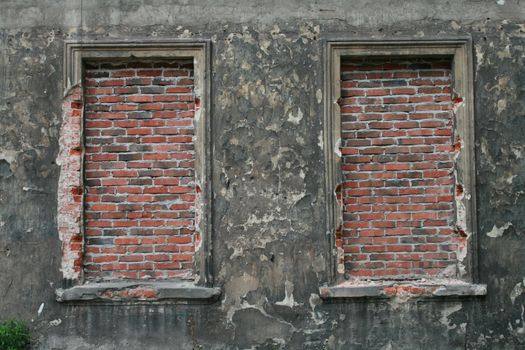 Bricked up windows in old building - outdoor image 