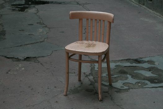 Empty chair symbolizing loneliness - outdoor image 