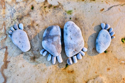 Footsteps of a pebbles on the rocky beach