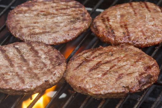 Grilled  Burgers on a Barbecue Grill close-up