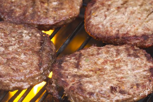 Grilled  Burgers on a Barbecue Grill close-up