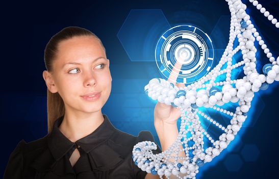 Beautiful businesswoman in dress smiling and presses finger on model of DNA. Scientific and medical concept