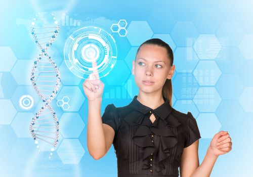 Beautiful businesswoman in dress presses finger on model of DNA. Scientific and medical concept