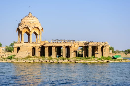 Ancient hindu stone temple in the middle of Gadisar lake, Jaisalmer, Rajasthan