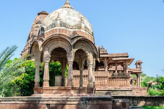 Ancient rock curved temples of Hindu Gods and godess at Mandor garden, Jodhpur, Rajasthan, India