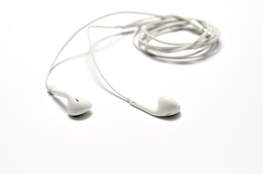 white earphones on a white background