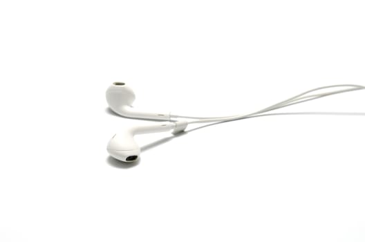 white earphones on a white background