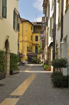 Street in Peschiera del Garda, a village of Garda Lake, and belong to the province of Verona, in Veneto, Italy.
