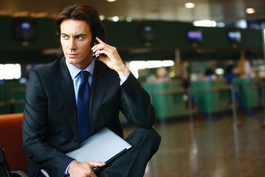 businessman who has sitting in the airport 