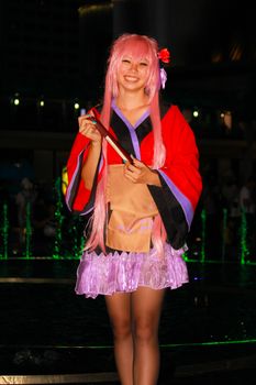 Bangkok - Aug 31: An unidentified Japanese anime cosplay pose  on August 31, 2014 at Central World, Bangkok, Thailand.