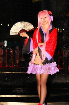 Bangkok - Aug 31: An unidentified Japanese anime cosplay pose  on August 31, 2014 at Central World, Bangkok, Thailand.