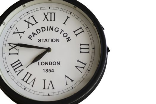 Old clock of Paddington Station in London with roman numbers