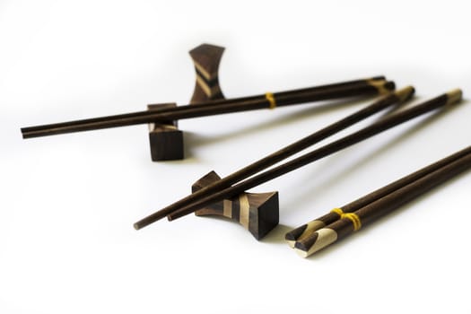 set of chinese chopsticks on a white background