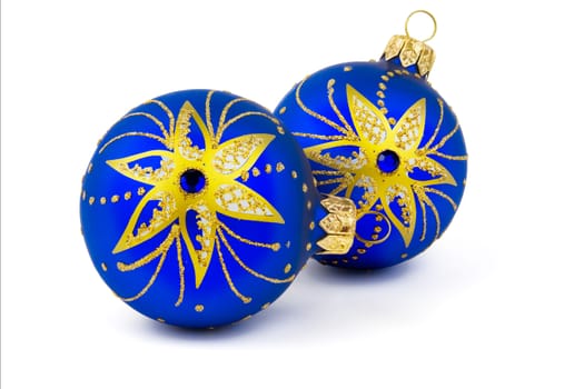 Two blue Christmas balls on a white background