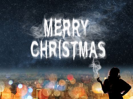 Christmas concept of lady with smoke text in the city night.