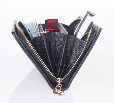 wallet. woman wallet with money on background