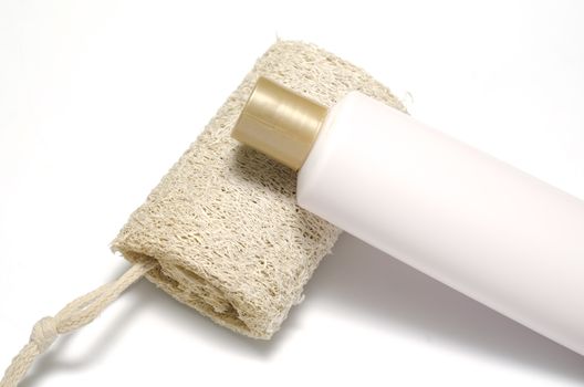loofah and liquid soap isolated on a white background