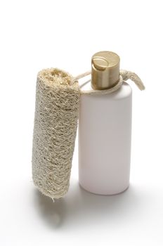 loofah and liquid soap isolated on a white background
