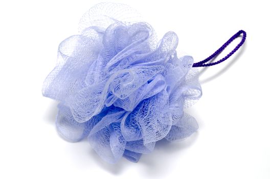 purple bath puff isolated on a white background