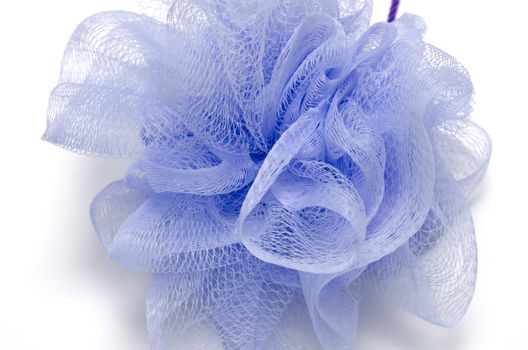 purple bath puff isolated on a white background