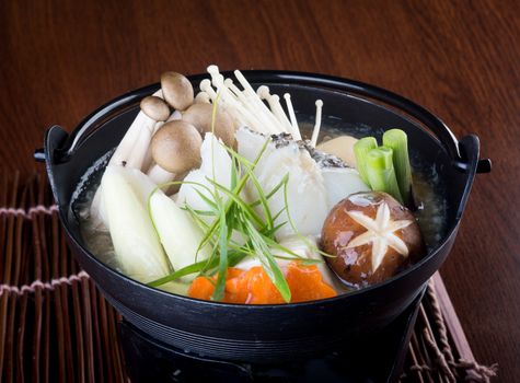 japanese cuisine. hot pot on background
