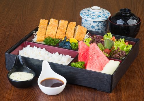 japanese cuisine. lunch box set on a background