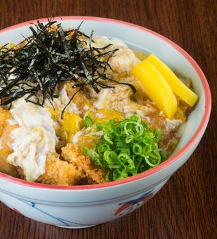 japanese cuisine. fried chicken rice on background