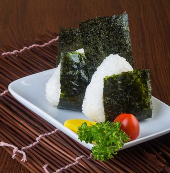 japanese cuisine. onigiri or rice on background