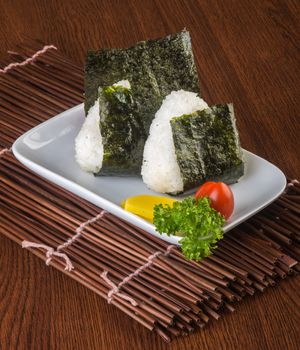 japanese cuisine. onigiri or rice on background