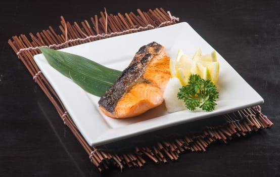 japanese cuisine. fried fish on background