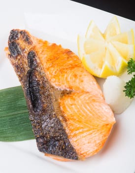 japanese cuisine. fried fish on background
